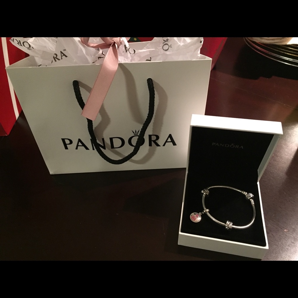 Iconic Pandora bracelet set with Grad ‘18 charm.